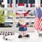 Glitzhome® 9" Patriotic Americana Polyresin Santa Holding Flags Table Decor